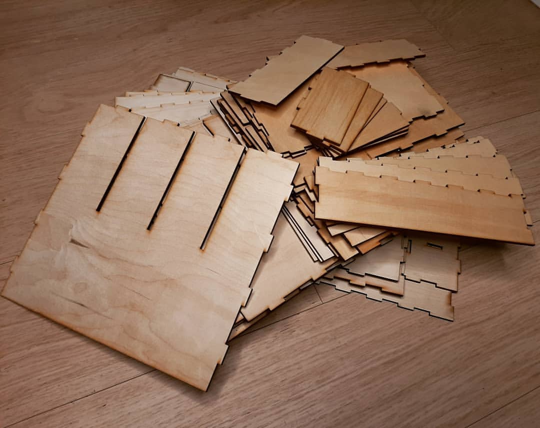 Laser-cut plywood parts of desk organizer