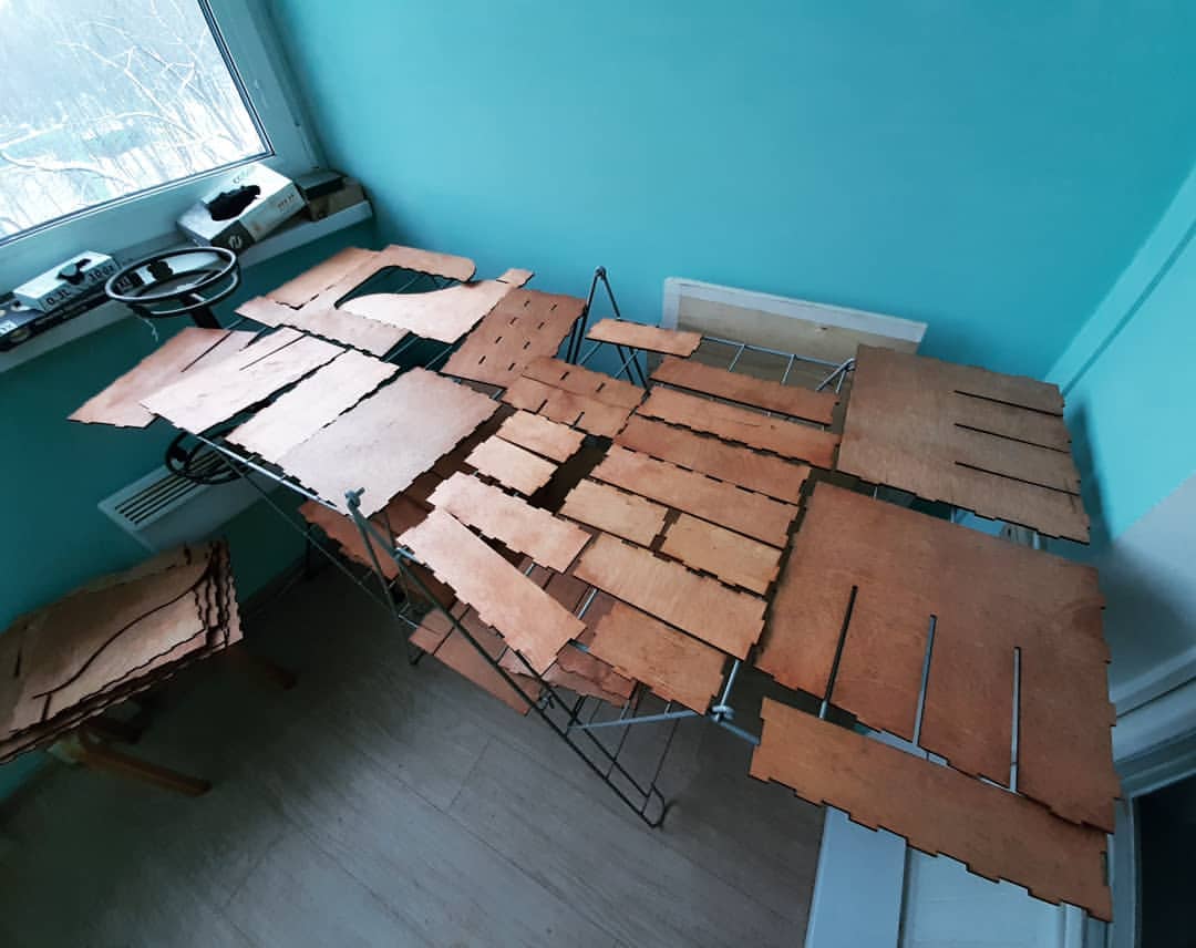 Polished and stained plywood organizer parts